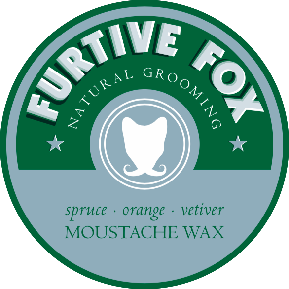 Mustache wax w/ spruce, orange & vetiver